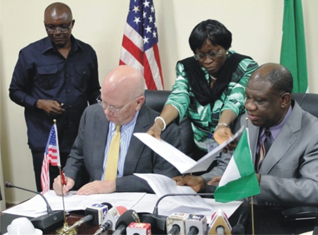 Nigeria, U.S. Sign Memorandum of Understanding on Electric Power on July 25, 2014. Ambassador James F. Entwistle and Power Minister Prof Nebo