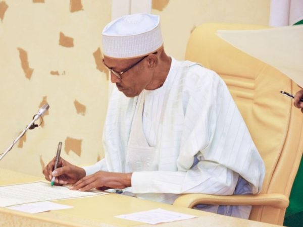 Buhari blames politicians, oil firms for tax losses