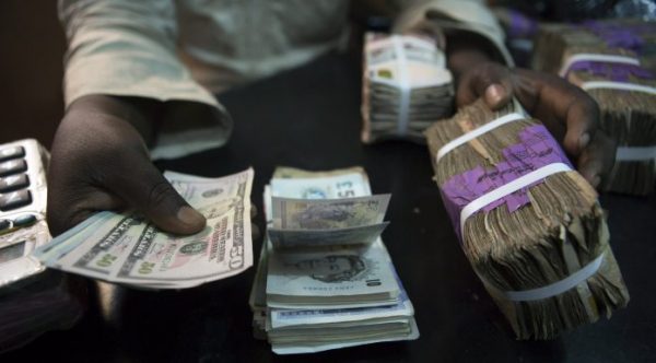 Naira gains, exchanges 430/$ as forex sale resumes