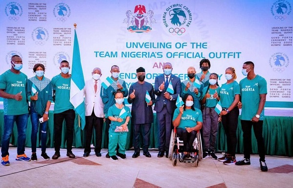 Buhari unveils Team Nigeria’s official outfit, wants repeat of 1996, 2000 feat